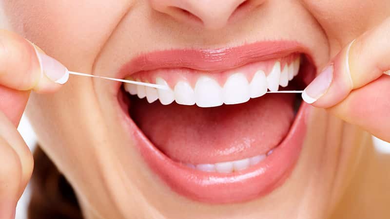Все преимущества использования зубной нити